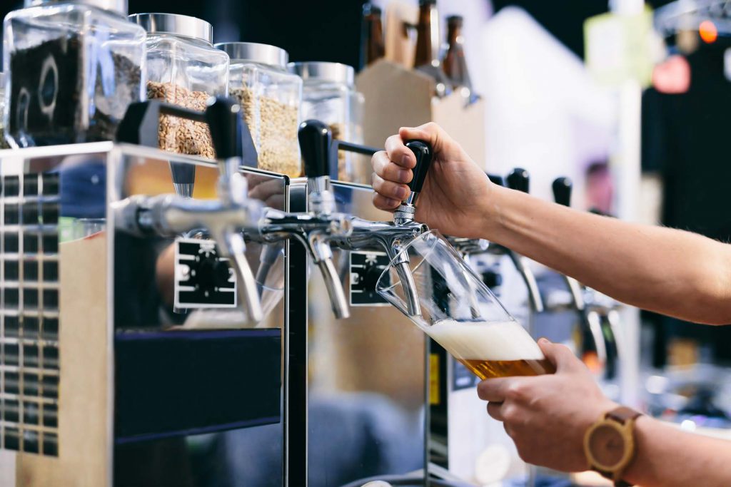 Bartender pulling pint